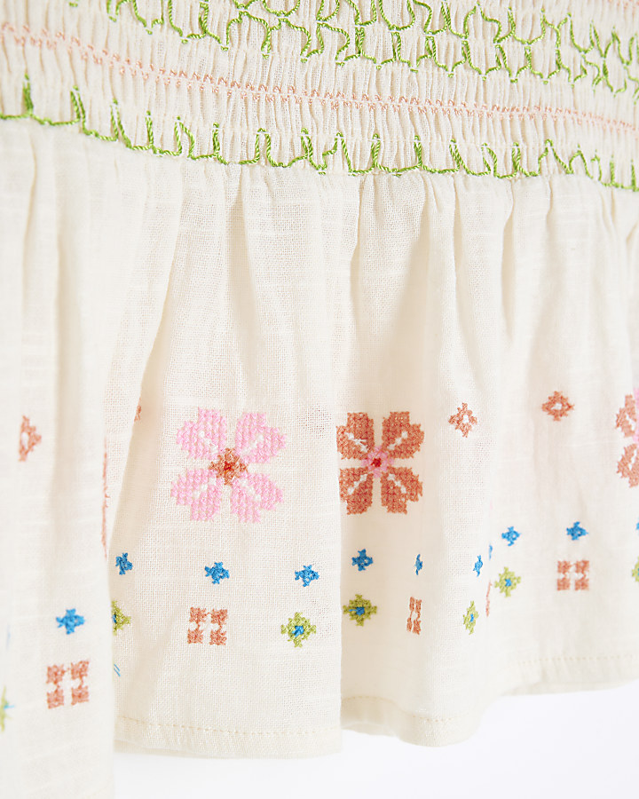 Cream embroidered shirred mini skirt