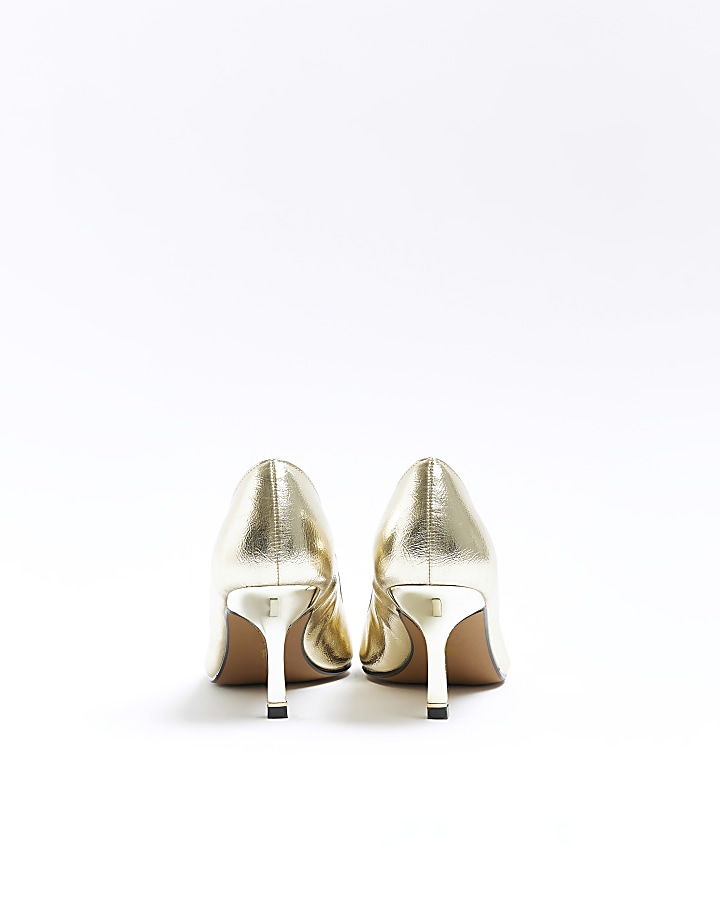 Gold heeled court shoes