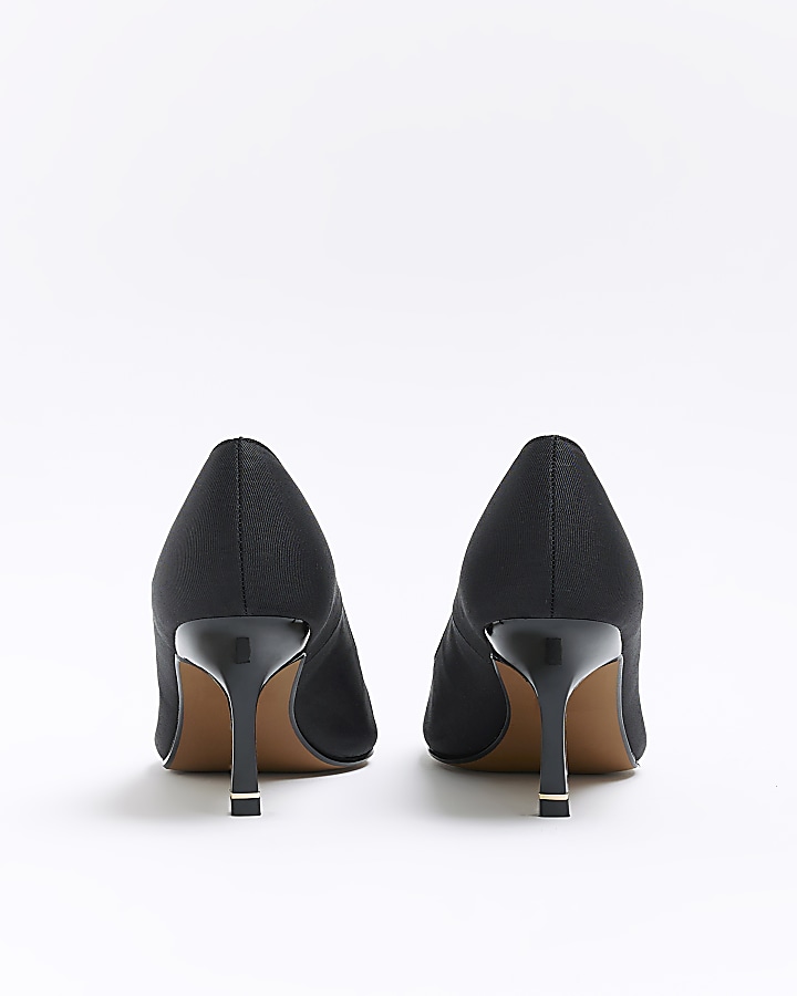 Black pointed toe heeled court shoes