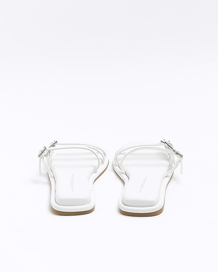 White buckle detail flat sandals