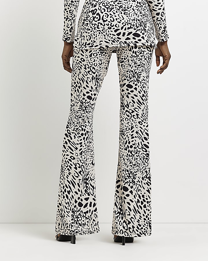 Black jacquard leopard print flare trousers