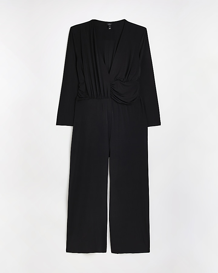 Petite black plunge long sleeve jumpsuit River Island