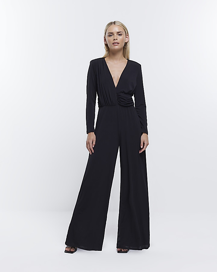 Petite black plunge long sleeve jumpsuit