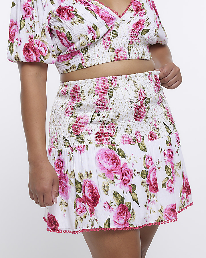 Plus pink floral print mini skirt