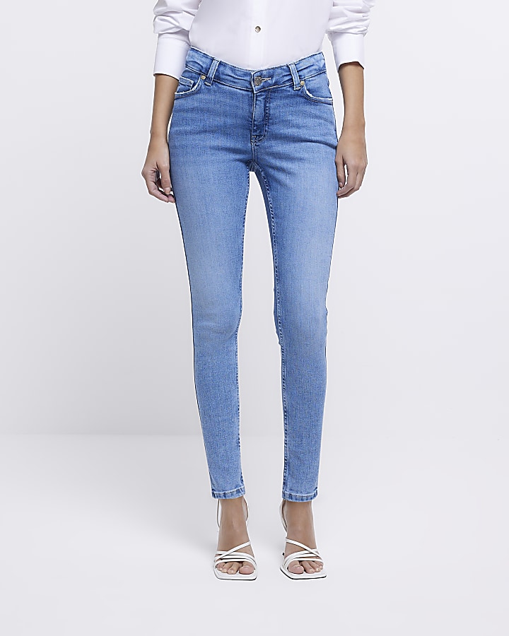 Blue low rise skinny jeans | River Island