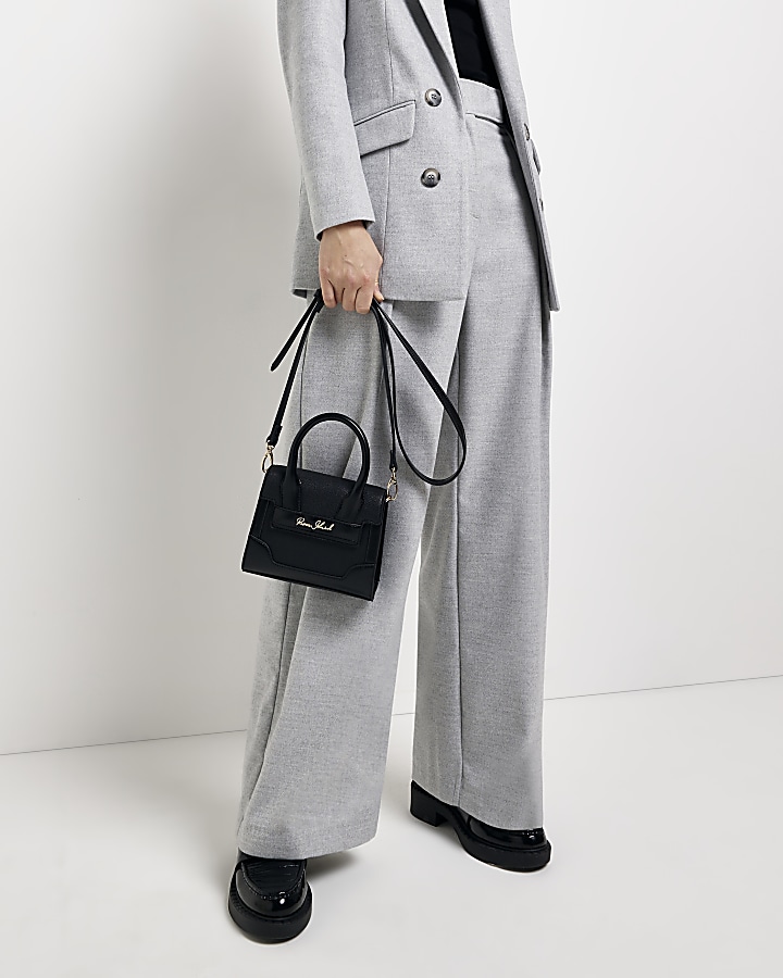 Black mini cross body bag River Island