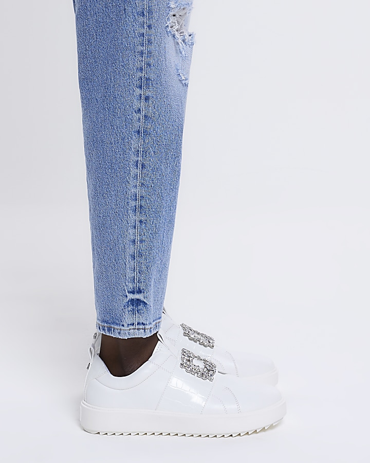White embellished buckle trainers