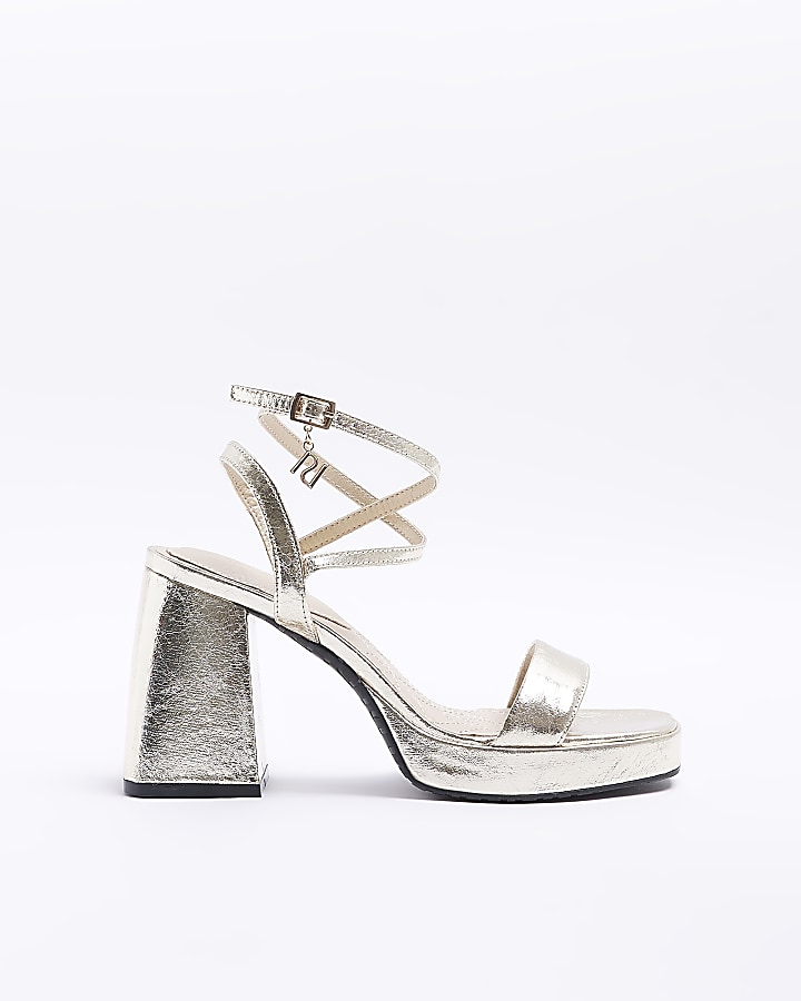 Gold metallic platform heeled sandals