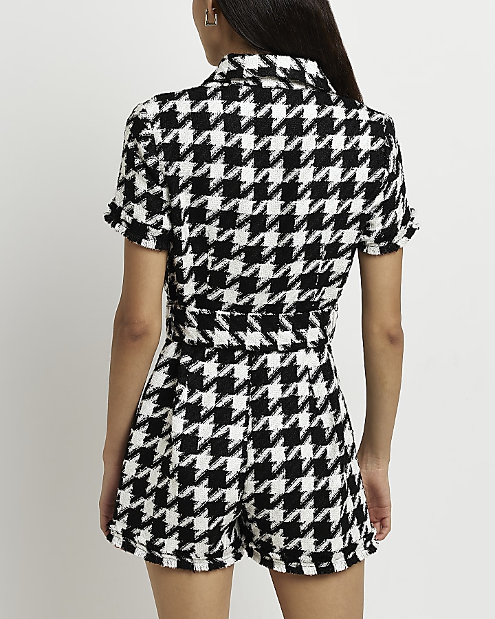 Black dogtooth boucle belted playsuit River Island