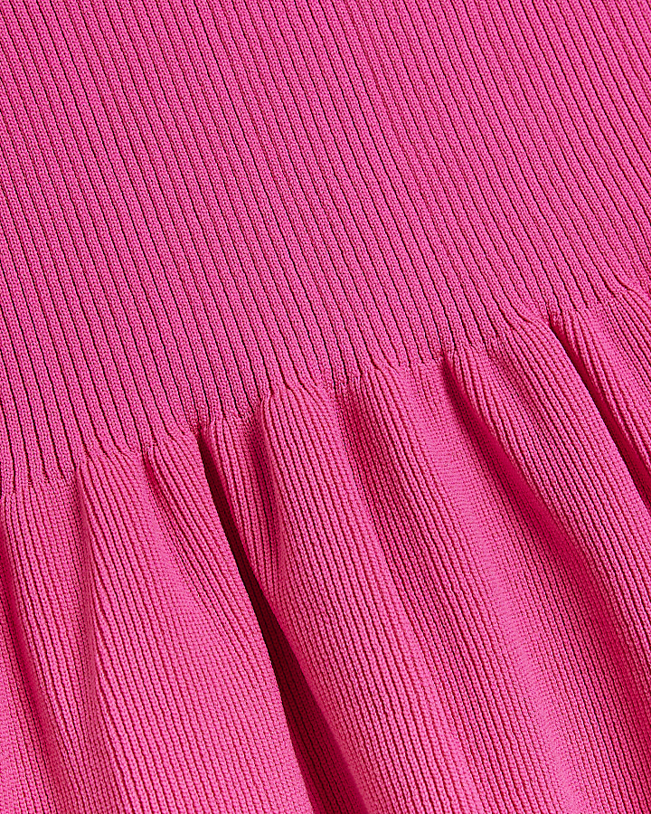 Pink knit peplum jumper