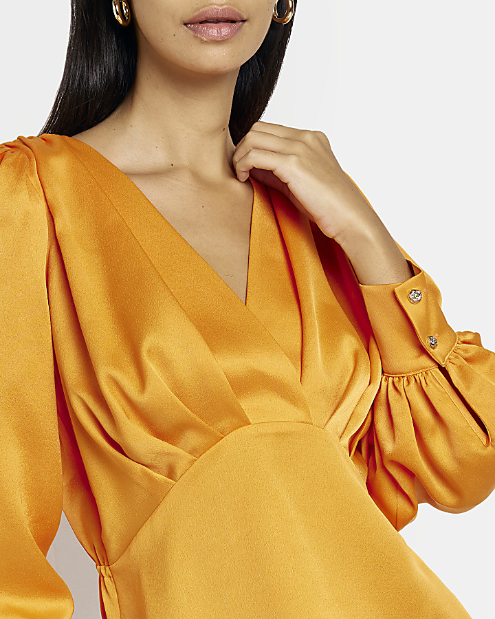 Orange satin wrap blouse