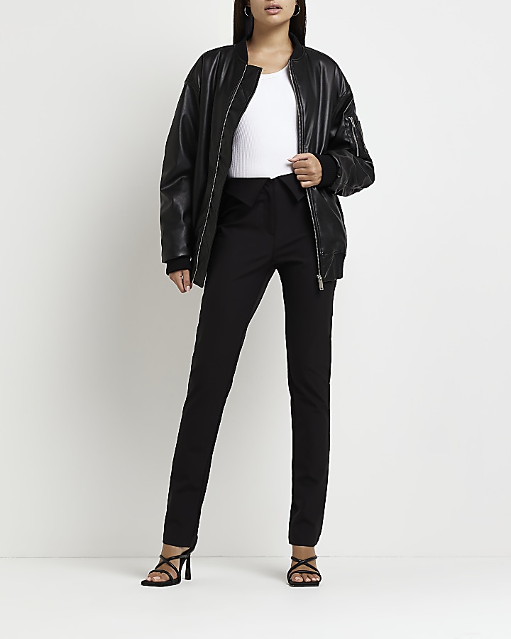 Black fold over skinny trousers