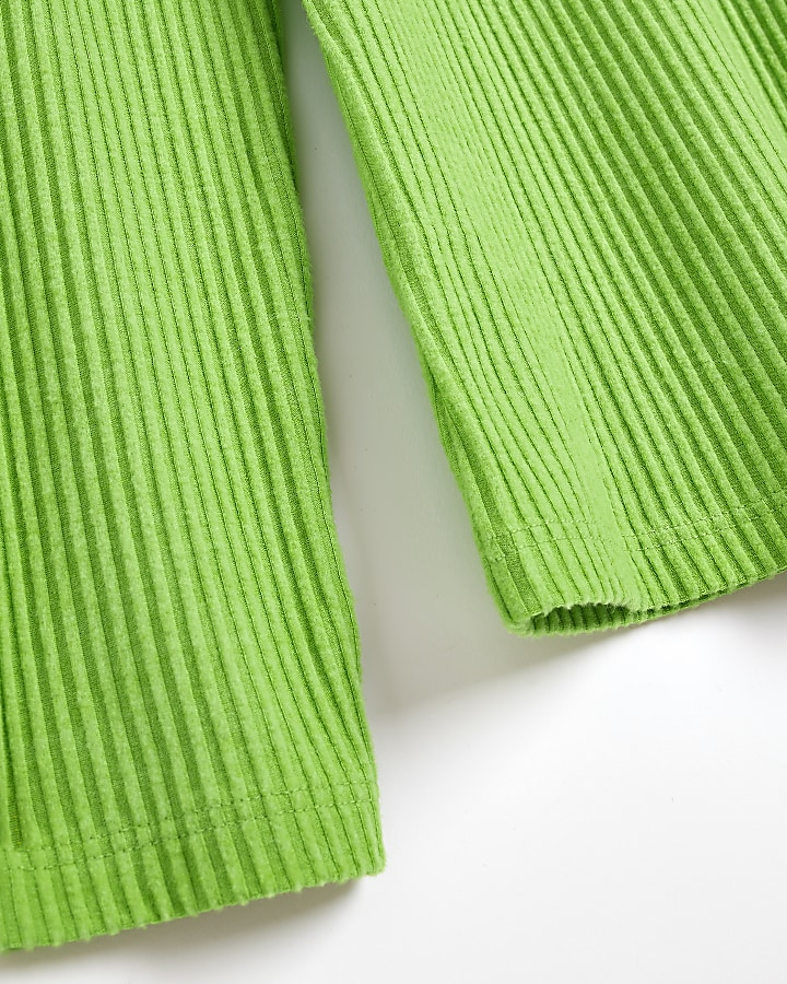 Green turtleneck long sleeve top
