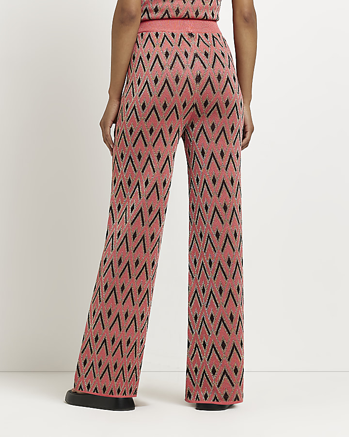 Pink print knit flared trousers | River Island