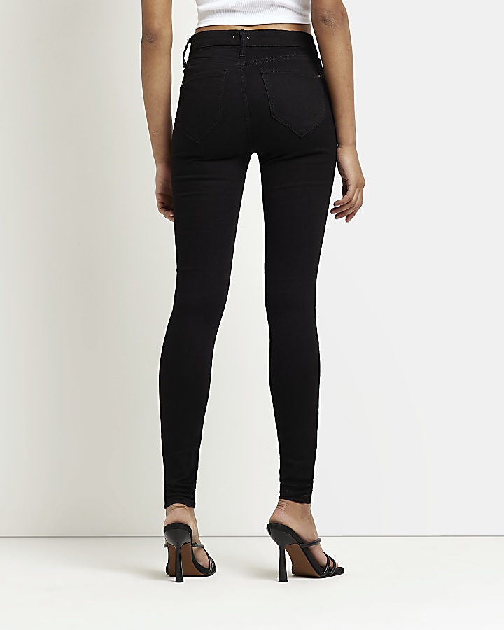 Tall Black Molly mid rise skinny jeans | River Island