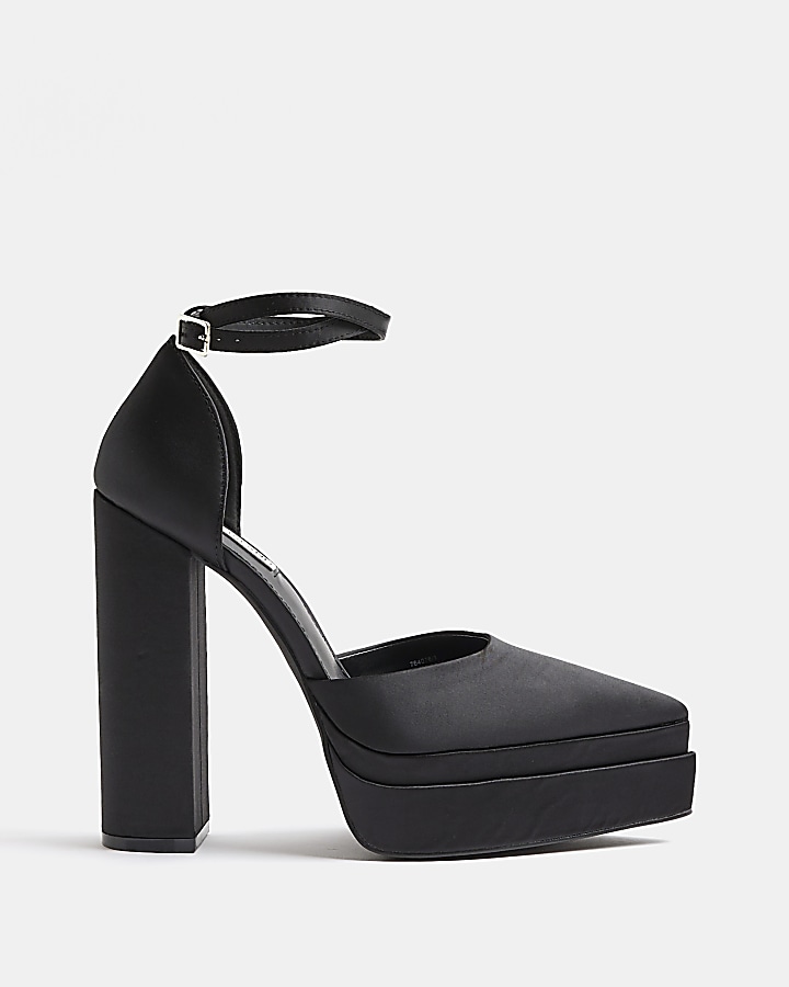 Black platform heeled shoes