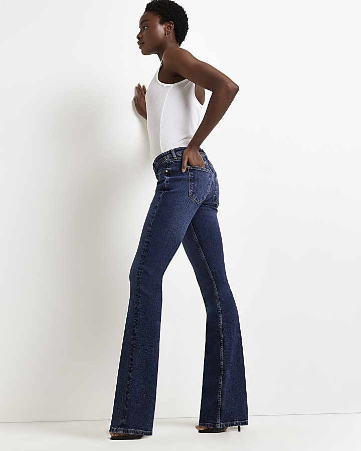 Blue low rise flared jeans | River Island