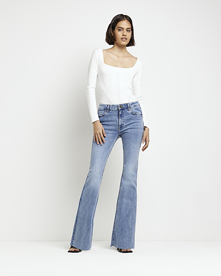 Blue mid rise flared jeans