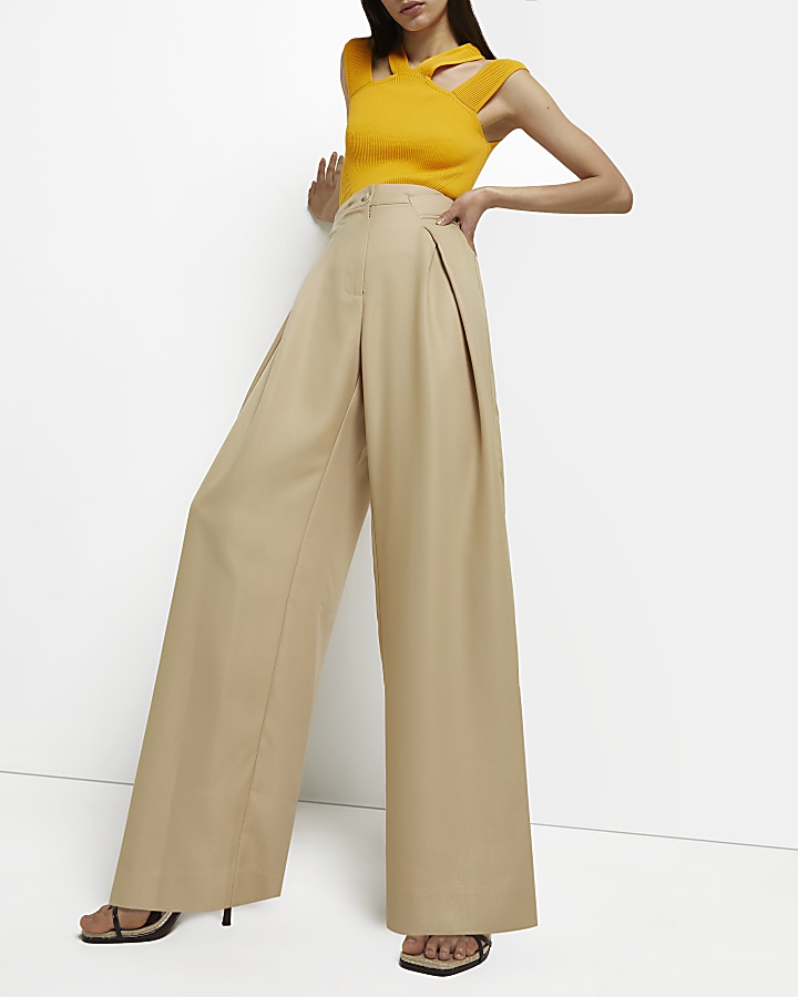 Beige cinched wide leg pleated trousers