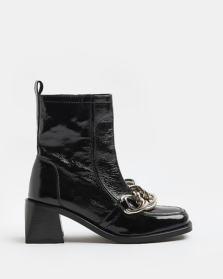 Black leather chain ankle boots