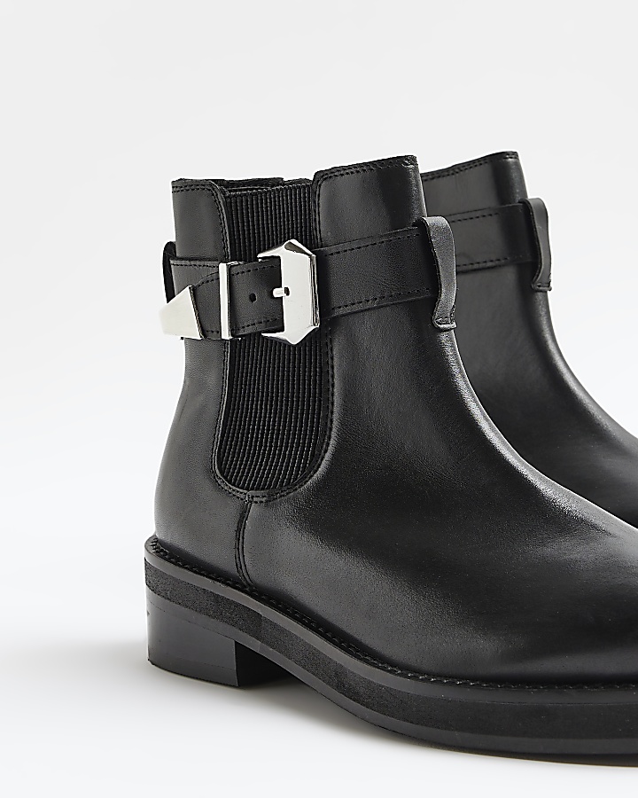 Black leather buckle ankle boots