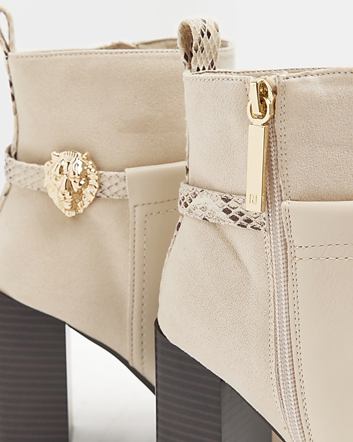 Cream heeled ankle boots