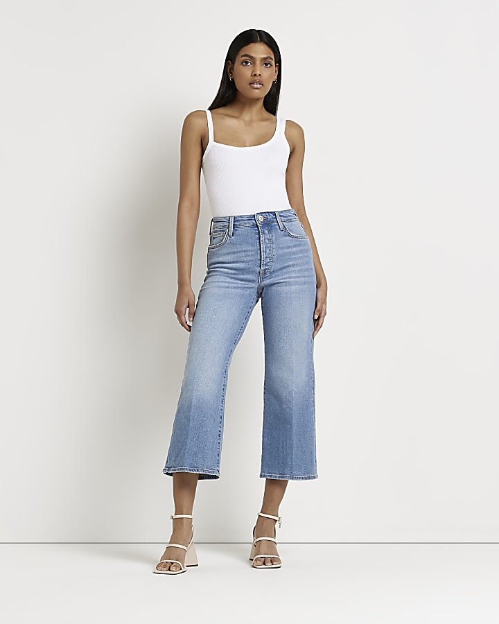 Blue mid rise cropped flared jeans