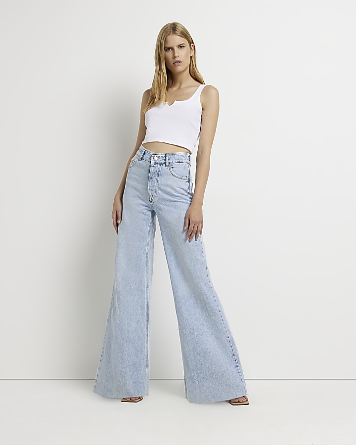 Blue mid rise ultra flared jeans | River Island