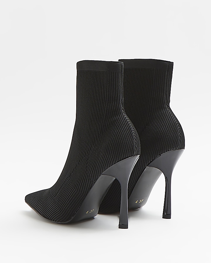 Black wide fit heeled sock boots River Island