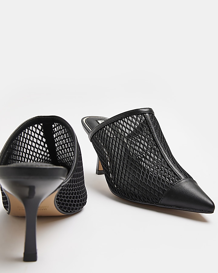 Black backless heeled court shoes