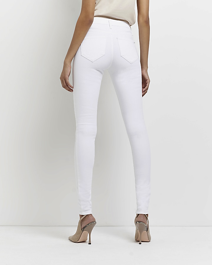 Tall white molly mid rise super skinny jeans