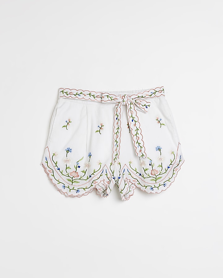 White embroidered floral shorts