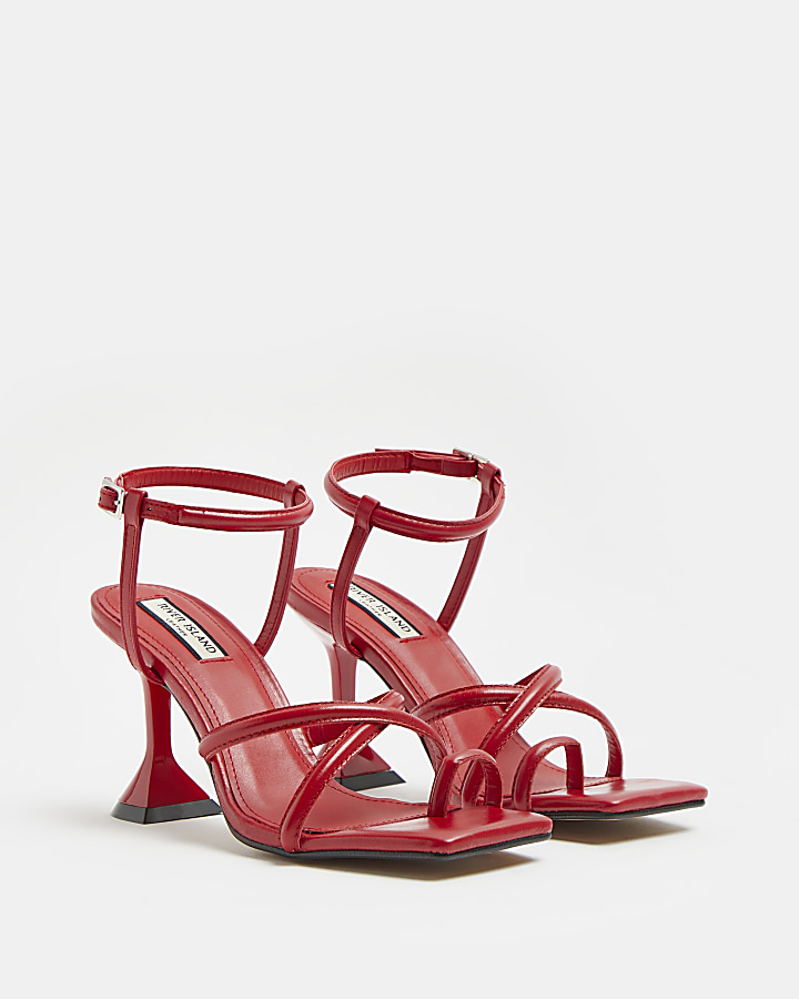 Red strappy heeled sandals