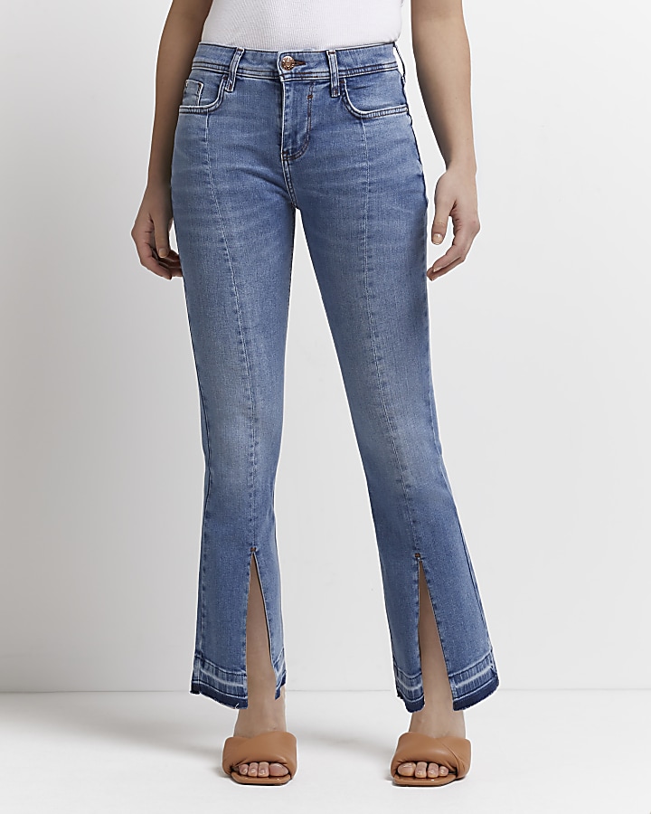 Petite blue mid rise flared jeans | River Island