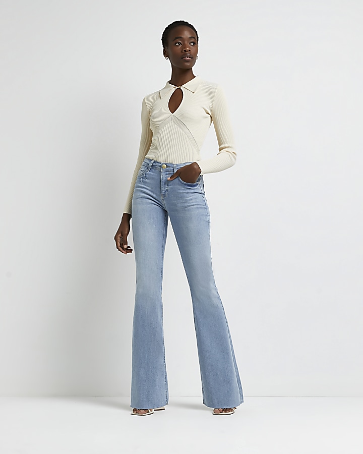 Blue mid rise flared jeans