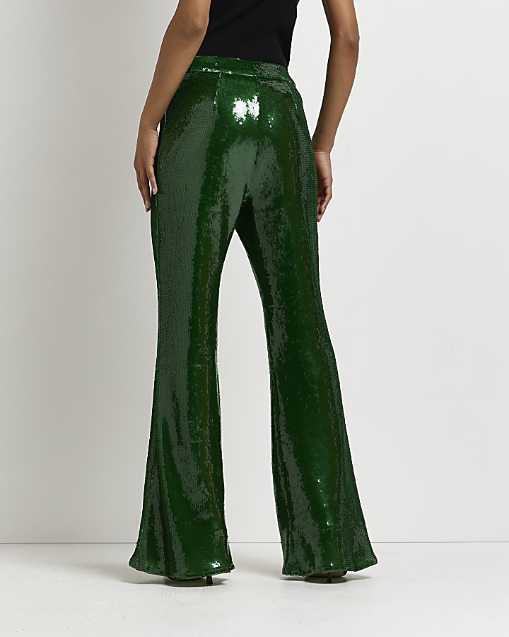 Green sequin flared trousers