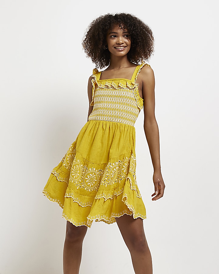 Yellow broderie mini dress