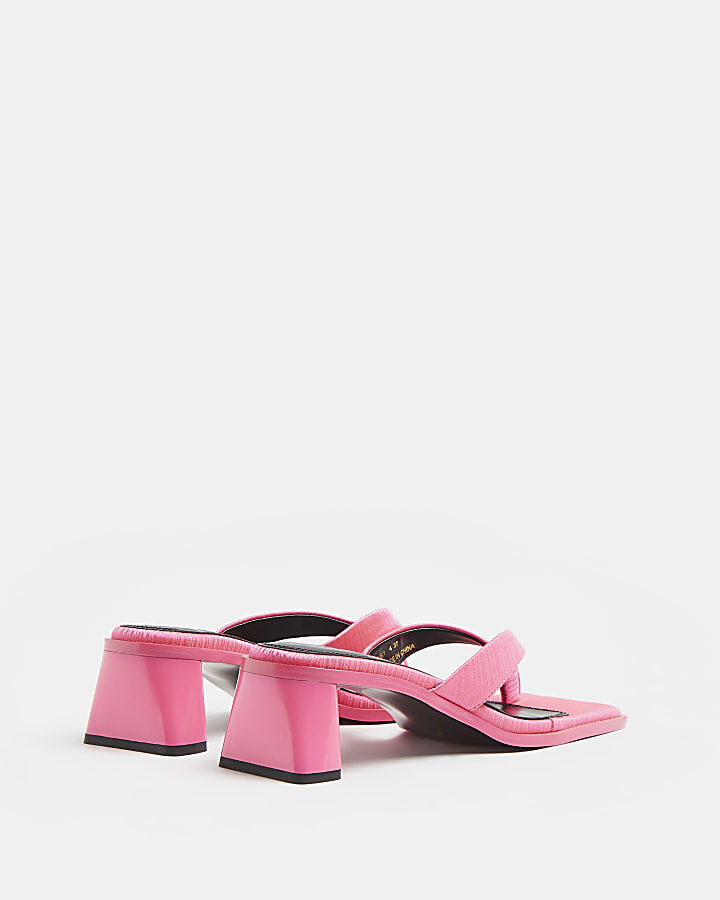Pink heeled mules