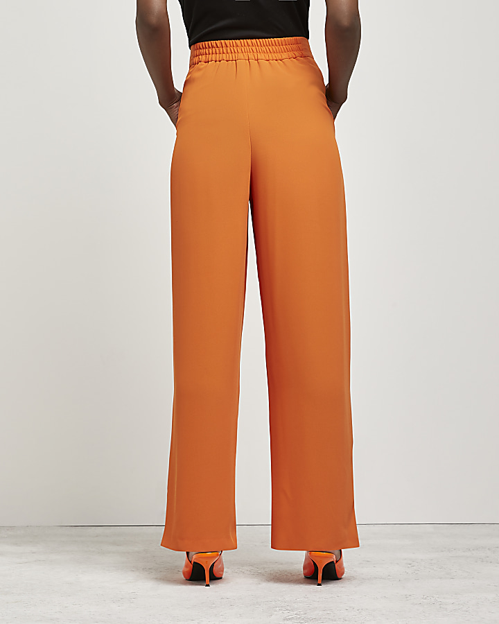 Orange wide leg trousers | River Island