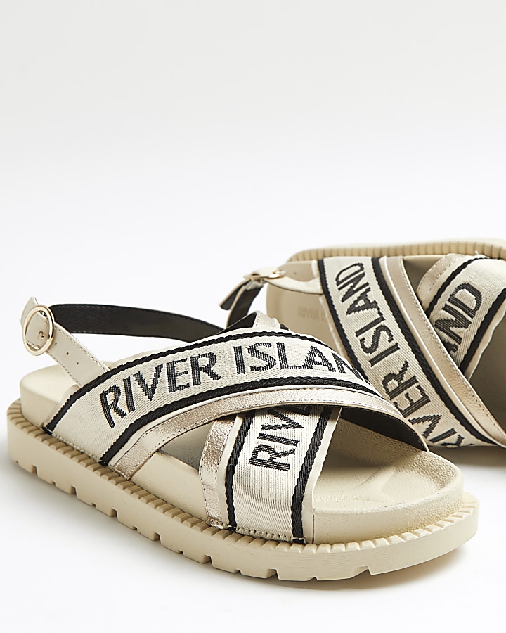 Cream RI branded cross over sandals