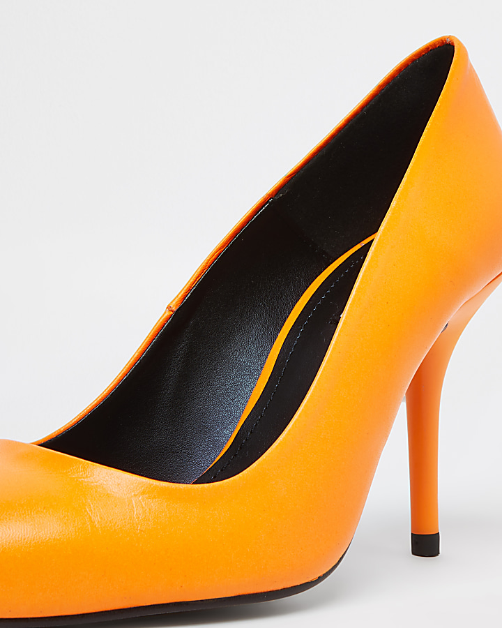 Orange court heel shoes