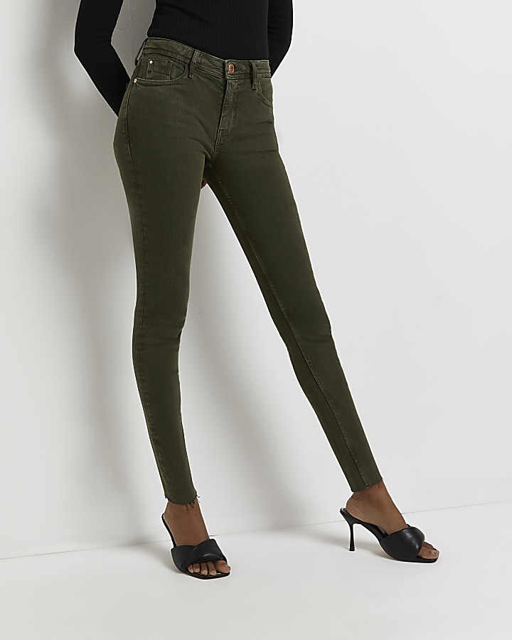 Khaki mid rise skinny jeans