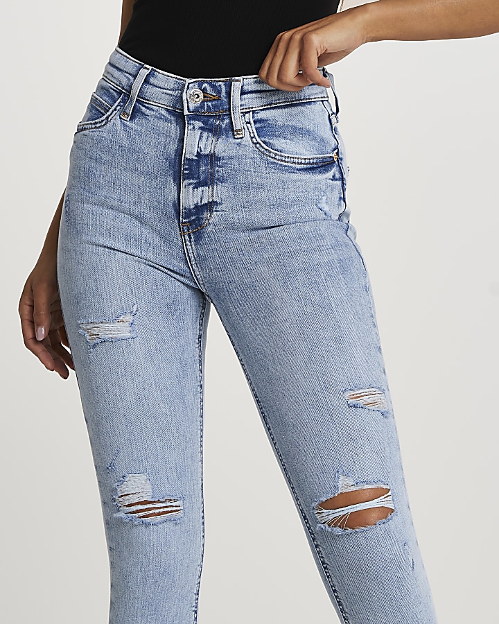 Blue high waisted ripped skinny jeans