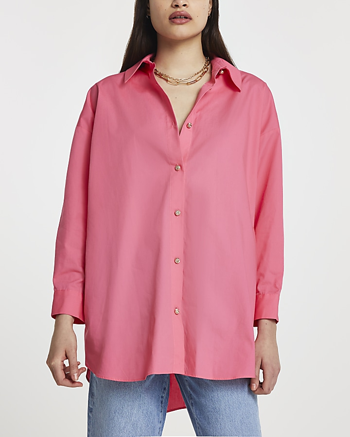 Pink cinched in oversized shirt