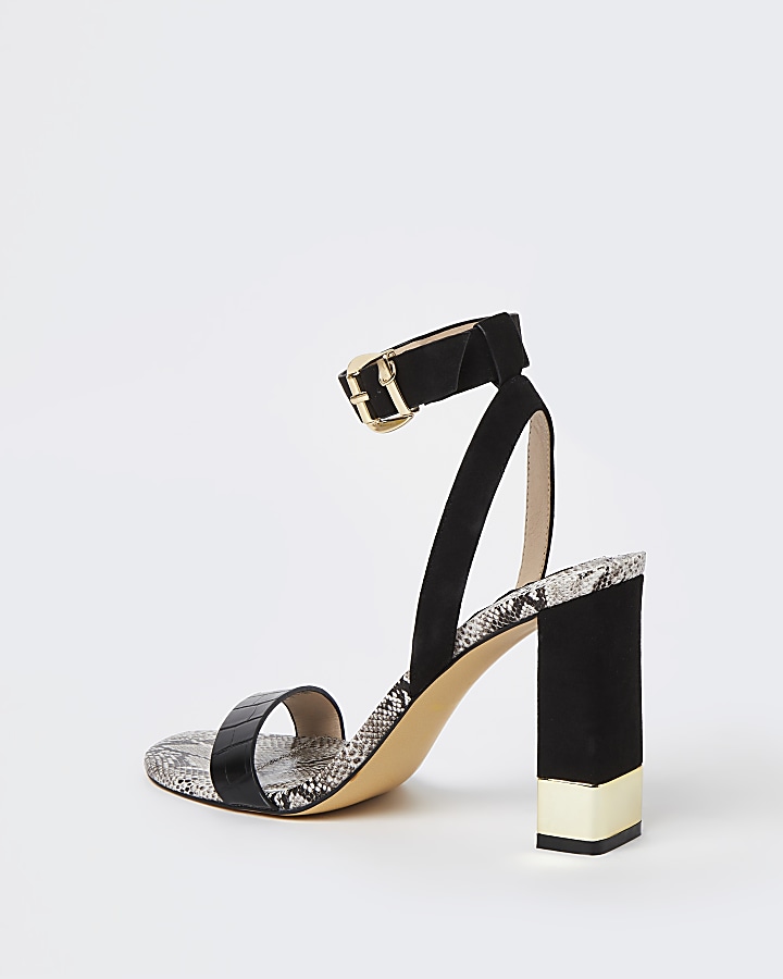 Black embossed block heels
