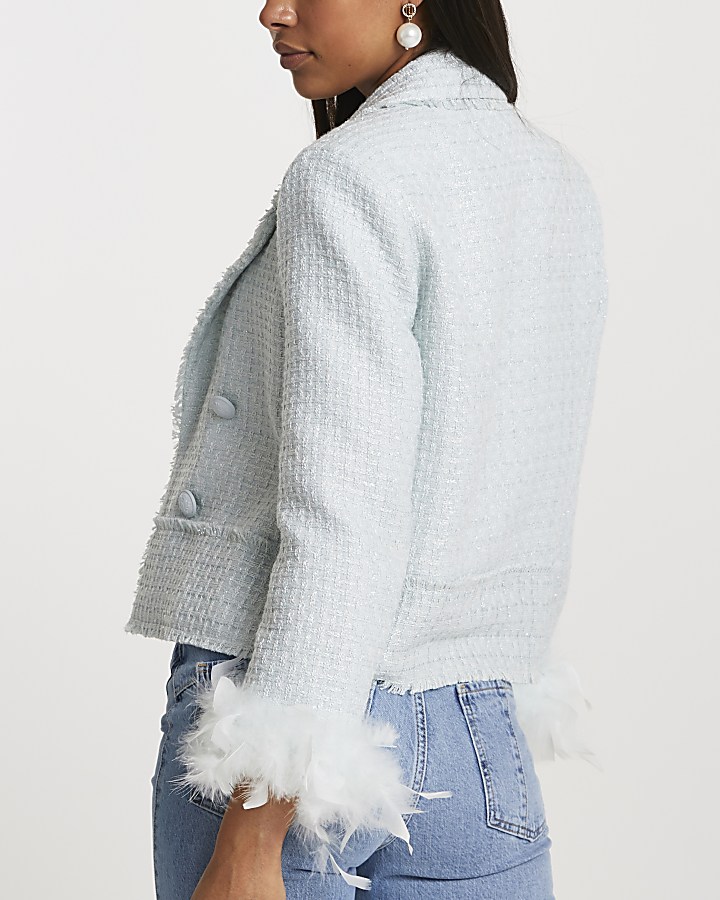 Green feather cuffed boucle jacket