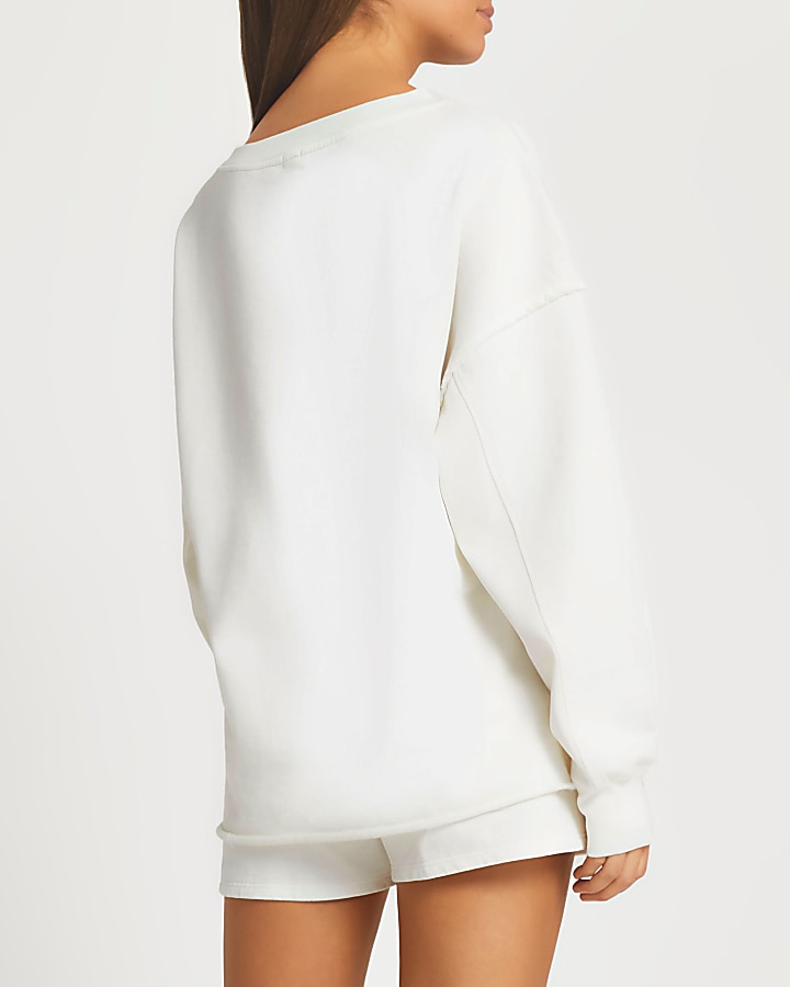 Cream long sleeve sweatshirt