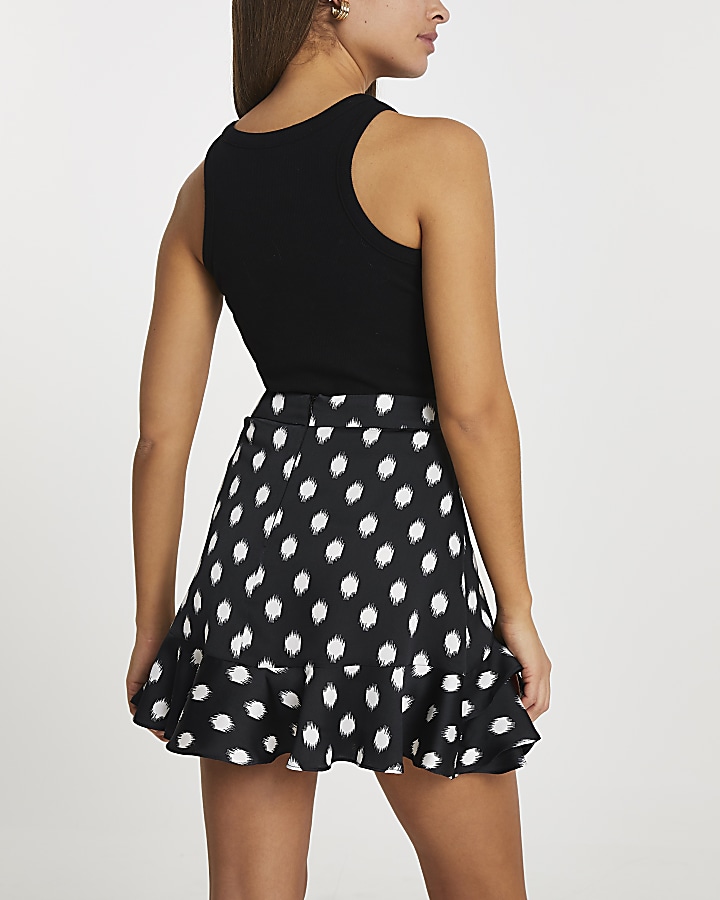 Black spot frill detail mini skirt