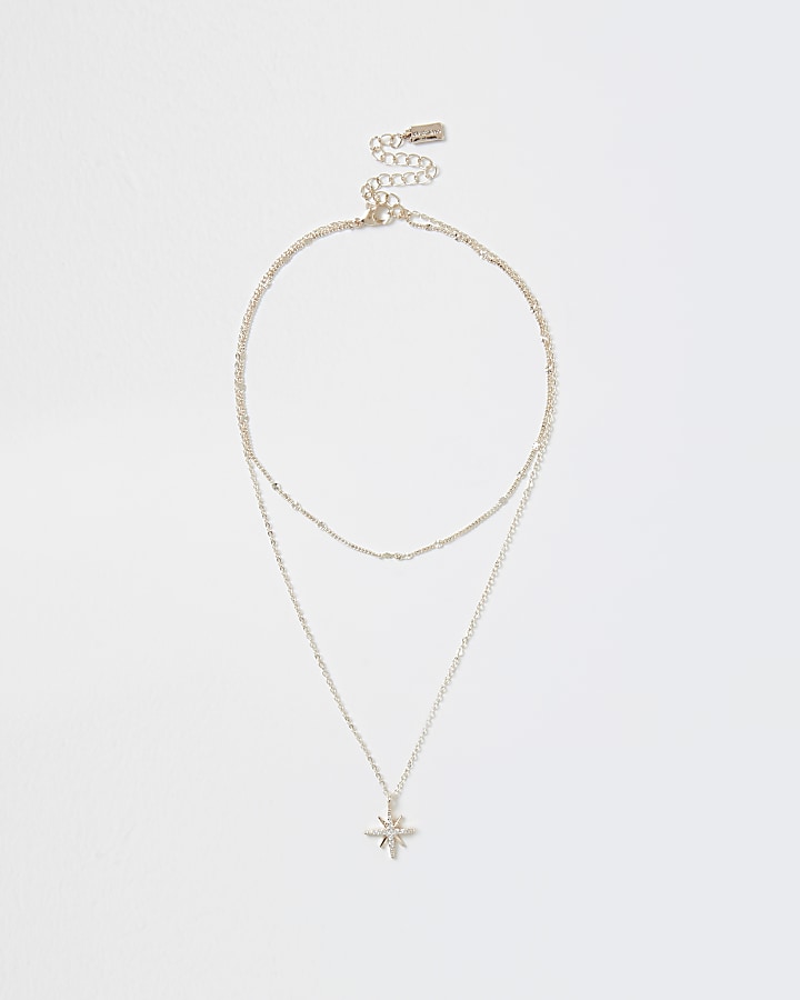 Rose gold colour star charm necklace