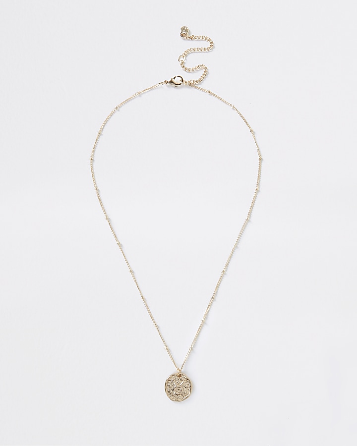 Gold Taurus horoscope coin necklace